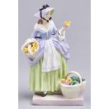 A Royal Doulton bone china figure of Spring Flowers, 1937-1959, 18.5cm h, printed mark Tiny chip