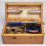Medical. A late Victorian brass and ferrous metal therapeutic electro-machine, with blue velvet