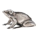 An Edwardian silver frog novelty pin cushion, 48mm l, by Adie & Lovekin Ltd, marks rubbed,