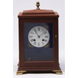 A mahogany mantle clock, with earlier French bell striking movement, enamel dial and Breguet