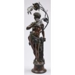 A bronzed electroformed metal figural lamp, in the form of a youth with panpipes and naked save