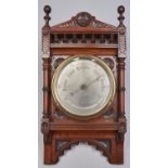 A Victorian walnut aneroid wall barometer, c1870, with silvered register and mercury thermometer,