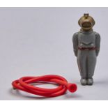 A miniature plastic Rising Thinking Diver toy, c1960