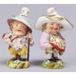 Two Derby figures of Mansion House Dwarves, c1820, richly decorated and gilt and standing on