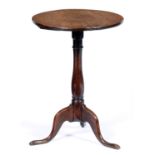 A George III oak tripod table, with baluster pillar, 51cm diam Top associated; good condition