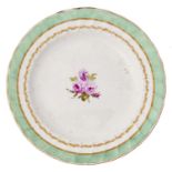 A Derby plate, c1795, painted by Wardle, with flowers in fluted green and gilt border, 23cm diam,