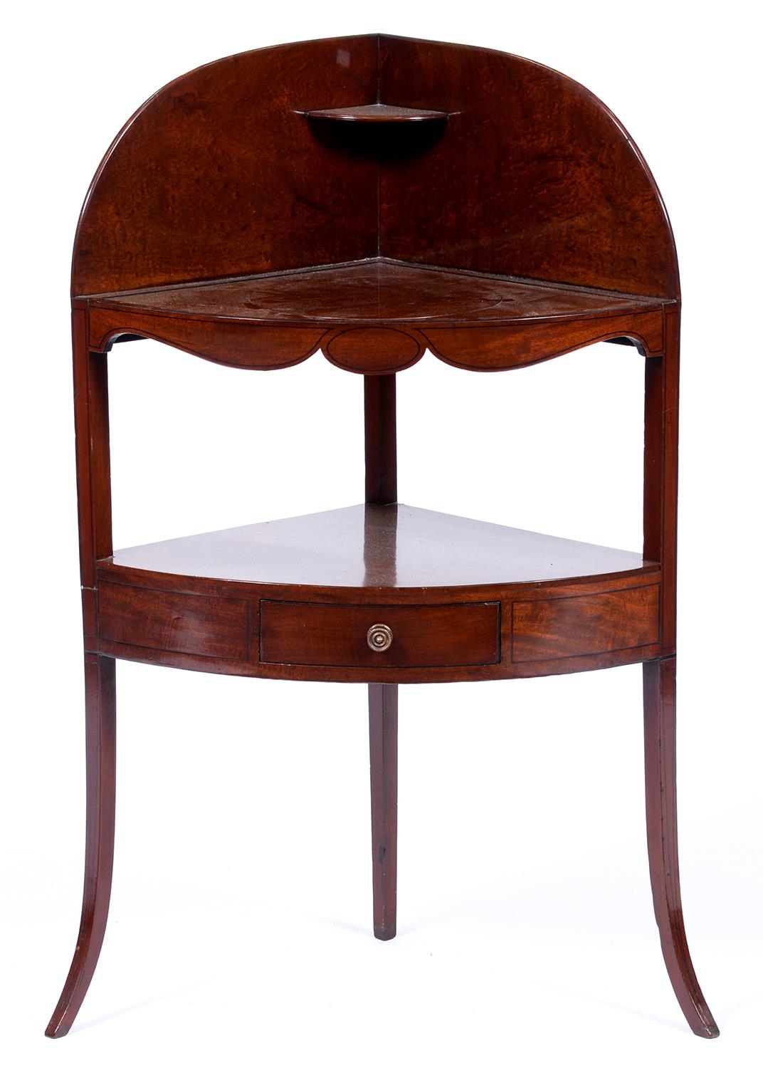 A George III mahogany corner washstand, 106cm h Re-polished, basin aperture filled with a piece of