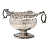 An Edwardian oval silver pedestal sweetmeat bowl,  with loose ring handles,  hammer textured, 90mn