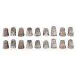 Fourteen English and Continental silver thimbles, late 19th and early 19th c, one overlaid in