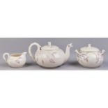 A Belleek Grass tea service, 1863-1890, the  teapot and cover 1891-1926, 11cm h, black printed