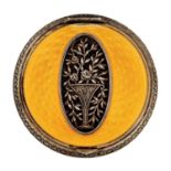 A continental silver and yellow guilloche enamel compact, c1930  the lid inset with an oval openwork