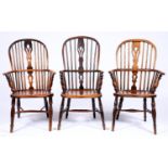 A Victorian yew wood Windsor chair, East Midlands Region, c1840, with elm seat and two similar