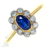 A sapphire and diamond cluster ring, early 20th c, in gold, marked 18ct, 3g, size Q Good condition