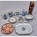A Chinese armorial porcelain dish, three contemporary blue and white mugs and an oval pie dish,