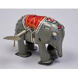 A Japanese lithographed tinplate  clockwork elephant toy, c1960 Good condition