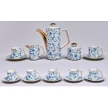 A Continental porcelain coffee service,  20th c decorated with blue flowers, six Swarovski glass