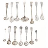 Twelve silver condiment spoons and ladles, the majority George III-Victorian, one gilt, various