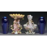 A Continental painted biscuit fruit stand and a contemporary flower vase, c1900, 23 and 25cm h and a