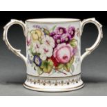 An English porcelain loving cup, probably Worcester-decorated, c1880, painted with a profusion of