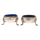 Two similar George II silver salt cellar, initialled to match, blue glass liners, 60mm diam, marks