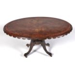 A Victorian walnut loo table, the figured, quarter veneered top crossbanded in tulipwood within