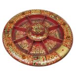 A George IV scarlet japanned Pope Joan game board, c1830, richly painted, gilt and varnished with