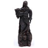 A carved walnut sculpture of a saint, French or German, 17th c, 37cm h Old worm damage and shrinkage