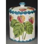 A Wemyss ware honey jar and cover, c1900, painted with strawberries, 12cm h, painted mark Jar - some