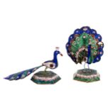 A pair of Indian silver coloured metal and enamel miniature models of peacocks, 20th c, on hexagonal