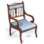 An Edwardian mahogany, rosewood and inlaid armchair, crossbanded in satinwood, with padded back,