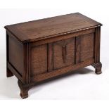 An oak blanket chest, c1920, on stiles, 53cm; 44 x 91cm and miscellaneous table linen, etc therein