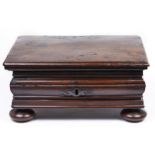 A Continental walnut bombe desk box, late 17th / 18th c, with sheet iron escutcheon, strap hinges