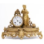 A French giltmetal mantle clock, late 19th c, in Louis XVI style, the cavetto base mounted with