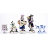 A pair of German porcelain figures of itinerant flower sellers, 20th c, 25cm h, a contemporary