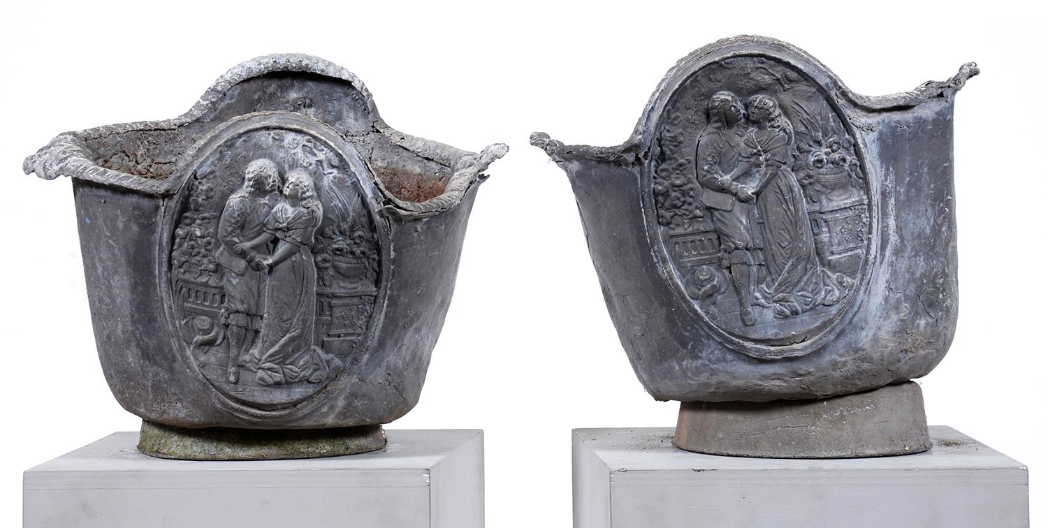 A pair of lead jardinieres, probably first half 20th c, cast with oval medallions of Paul and