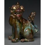 A Chinese stoneware model of a dog of Fo, in curdled turquoise and brown glazes, 17cm h Good