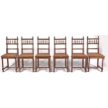 A set of six French or Belgian walnut dining chairs, late 19th c, with spindle back and rush seat,