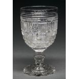 An English cut glass goblet, c1840, the bowl engraved to the rim with foliate initials JMW, on