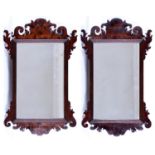 A pair of mahogany fretted frame mirrors, 20th c, with reeded slip, 62cm h Good condition