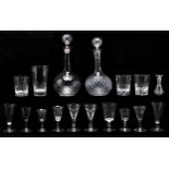A pair of moulded shaft-and-globe glass decanters and stoppers, mid 19th c, 31cm h, two pairs of