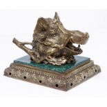 A cast brass and malachite decorated porcelain boar's head novelty inkwell, 20th c in 19th c