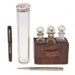 A Waterman lady's fountain pen, a silver propelling pencil, a lass jar with silver bun shaped cap