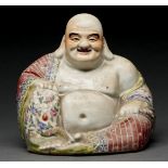 A Chinese famille rose figure of Budai, 20th c, 23.5cm h, oval impressed mark Much dirt but good