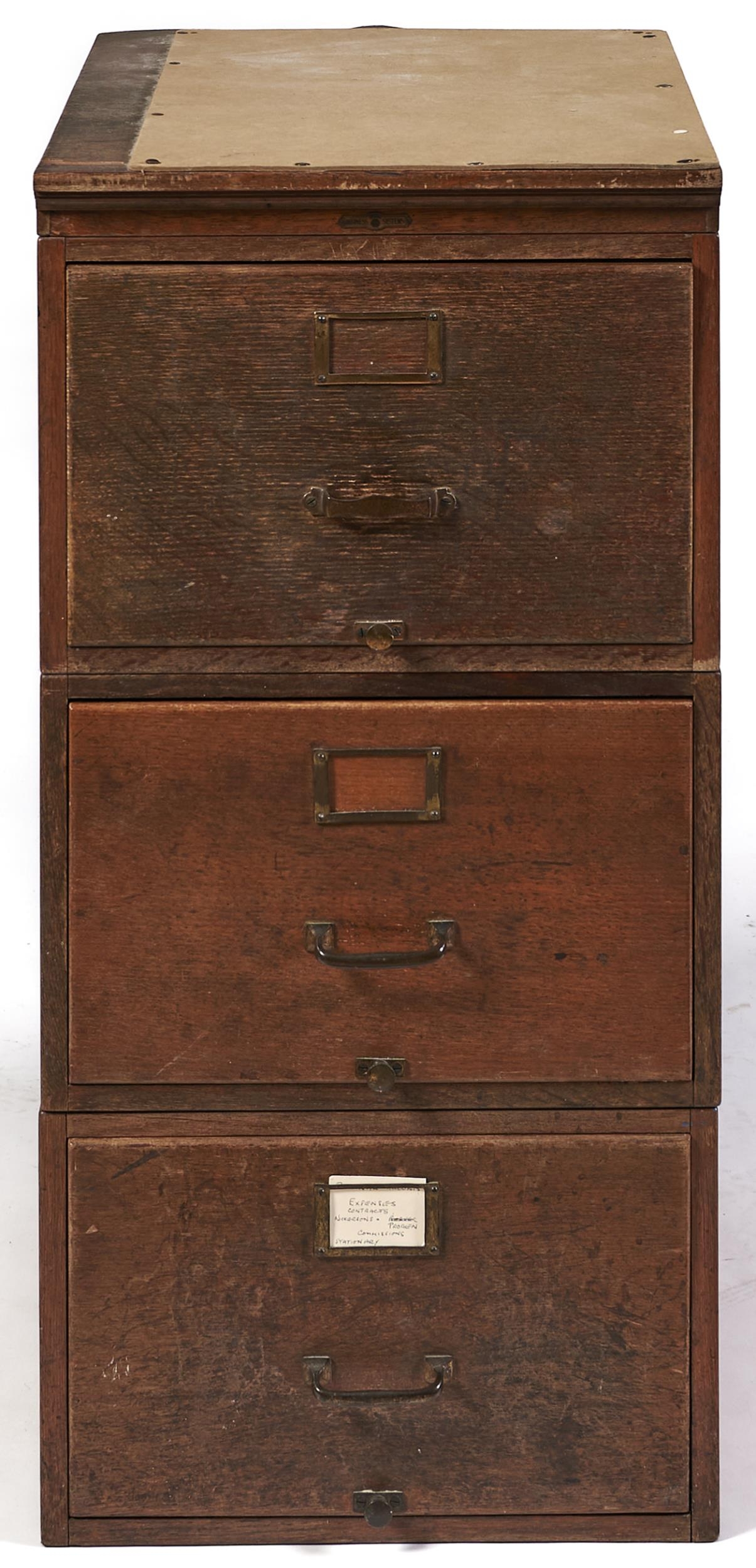 An oak filing cabinet, second quarter 20th c, in three separate sections with panelled sides,