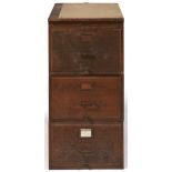 An oak filing cabinet, second quarter 20th c, in three separate sections with panelled sides,