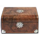 A Victorian walnut workbox, crossbanded and inlaid with a mother of pearl and abalone star to the