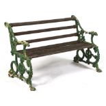 A garden seat with cast iron ends, possibly Coalbrookdale Co, Hound Head pattern, 121cm l