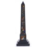 An Ashford style and coloured hardstone obelisk, 20th c, on stepped square base