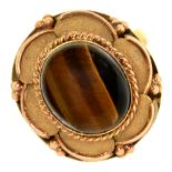 A tiger eye ring, in gold, unmarked, 6.7g, size N Good condition