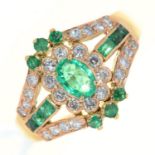 An emerald and diamond ring, with round, oval and calibre cut emeralds and round brilliant cut